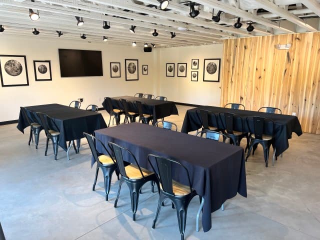 Eddy event space with tables and chairs. Eddy event space with tables and chairs.