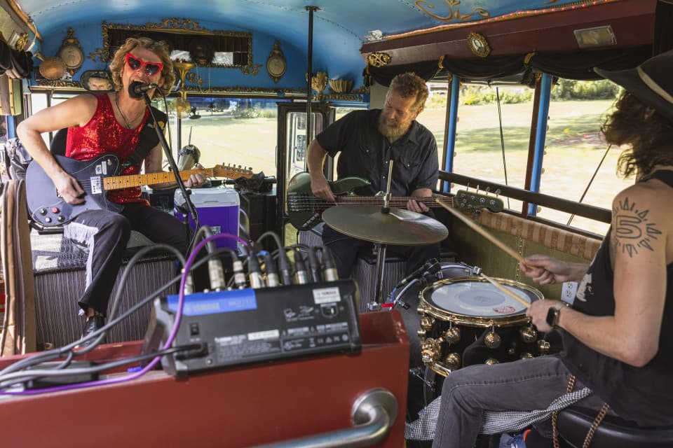 Band plays on the LaZoom bus while guests travel to three Asheville breweries Band plays on the LaZoom bus while guests travel to three Asheville breweries